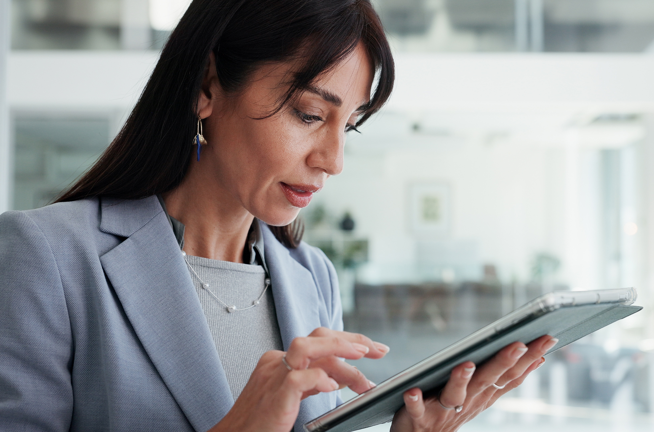 Reading,,Mature,Or,Business,Woman,With,Tablet,In,Office,,Planning