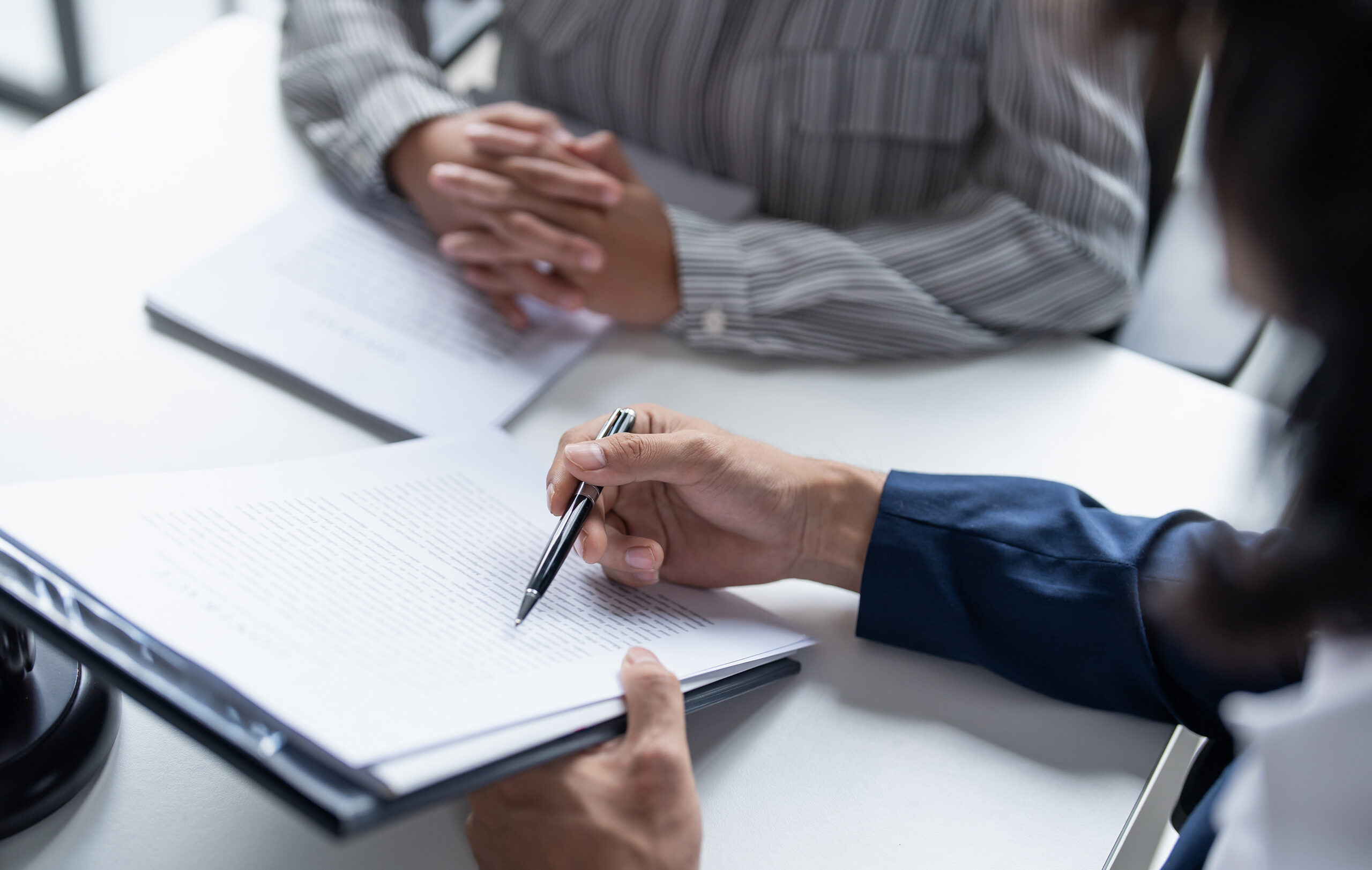 Lawyer,Businessman,Working,With,Lawbook,In,Office,Or,Courtroom,Legal